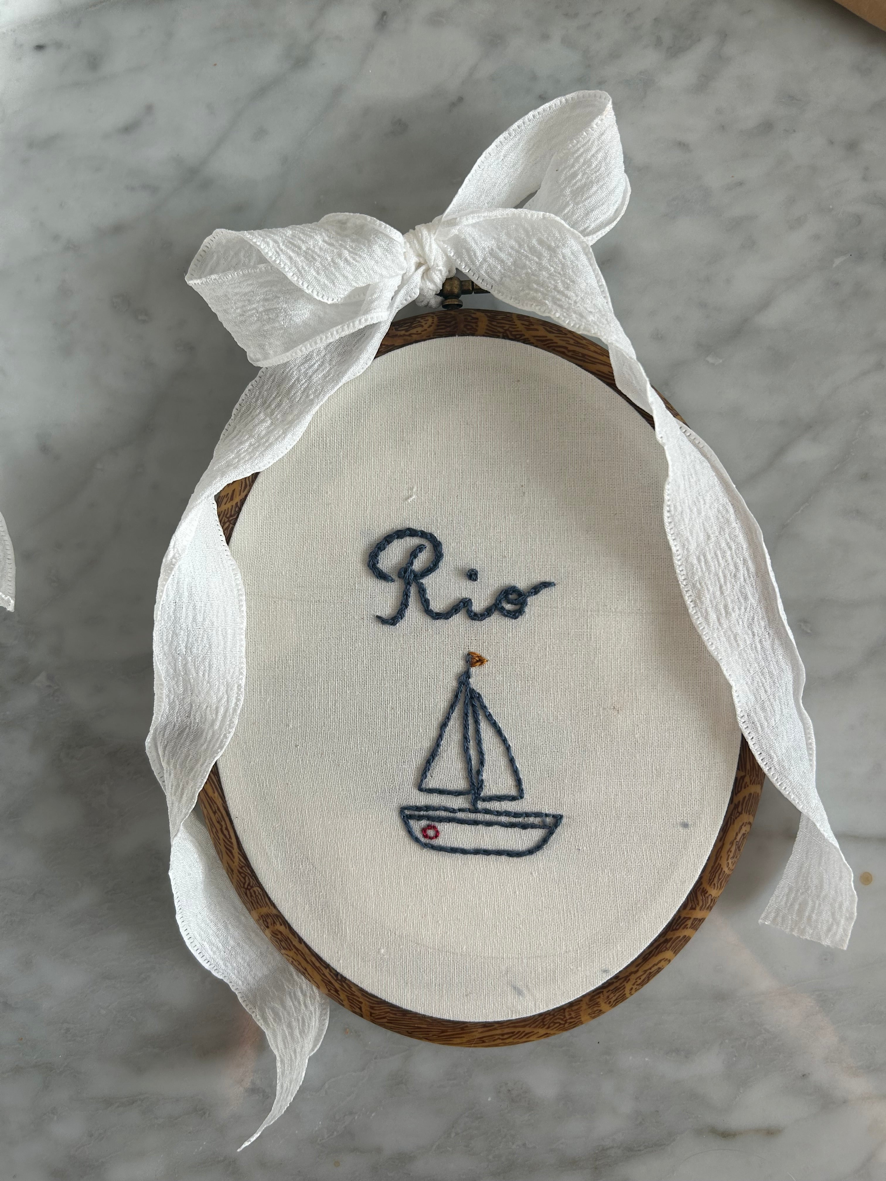 Hand embroidered name hoop