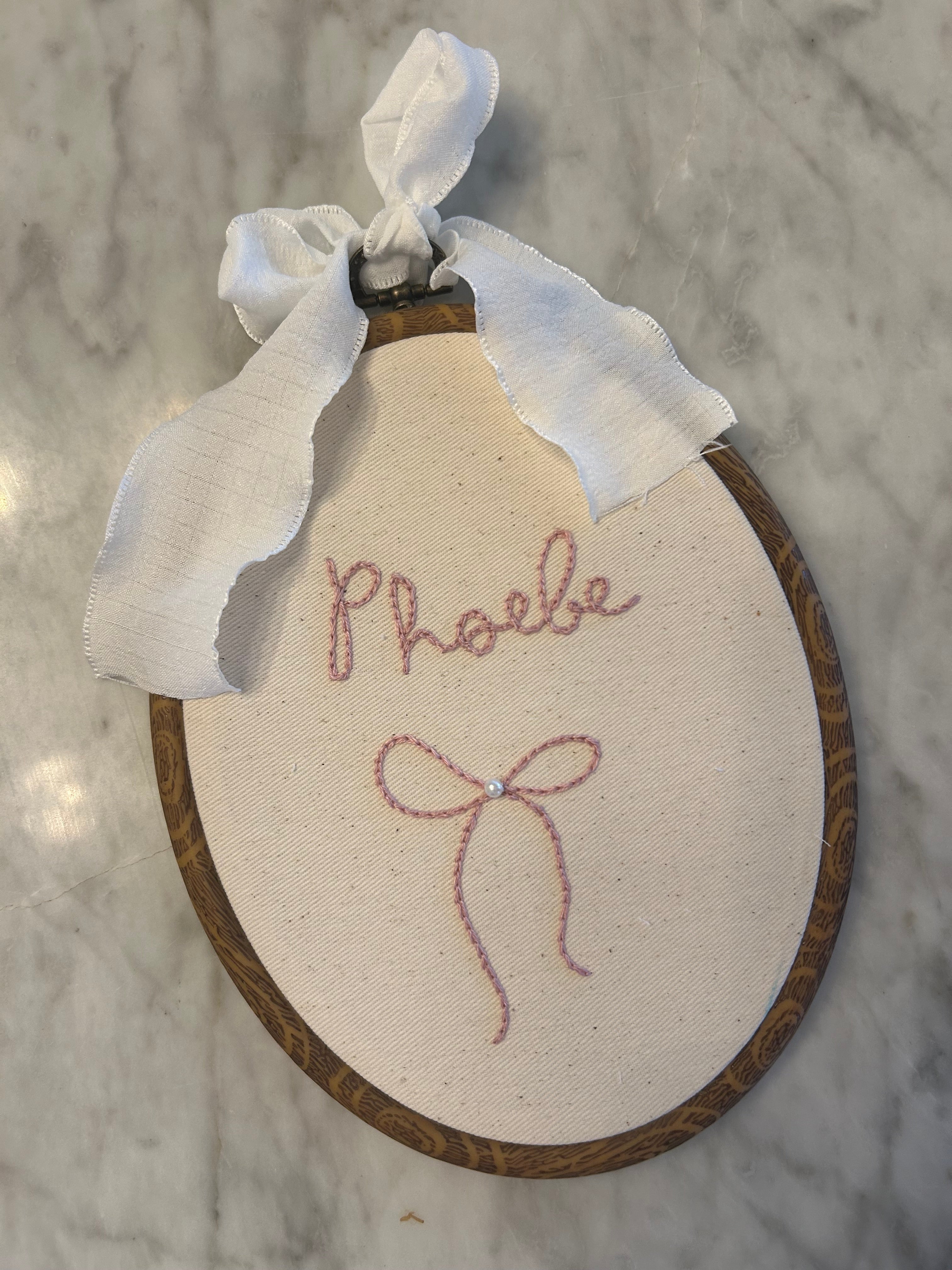 Hand embroidered name hoop